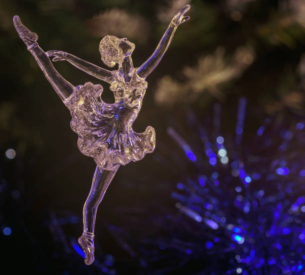 istock Glass ballet dancer on Dark background. Old style. Selective focus 860459376