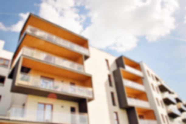 istock Abstract blur of modern apartment building. 860463258
