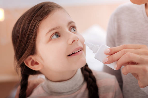 istock Curious recovering child with nasal drops 860464554