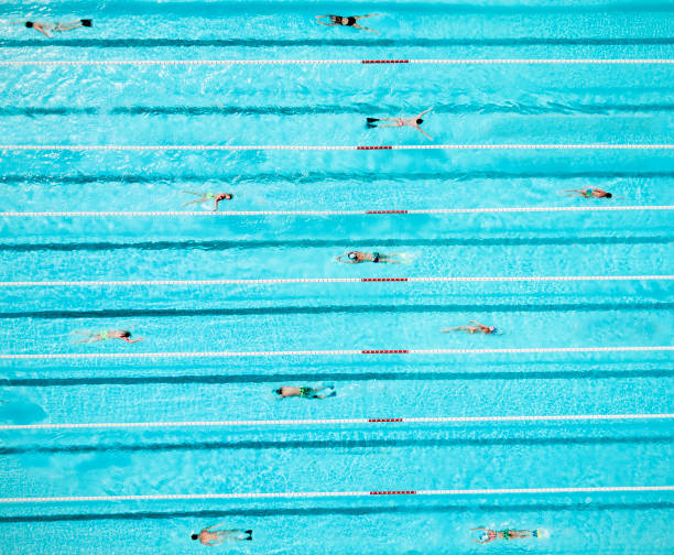 istock Aerial View of Swimmers in a Blue Pool 860469248