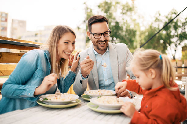 istock Family enjoying restaurant 860471776