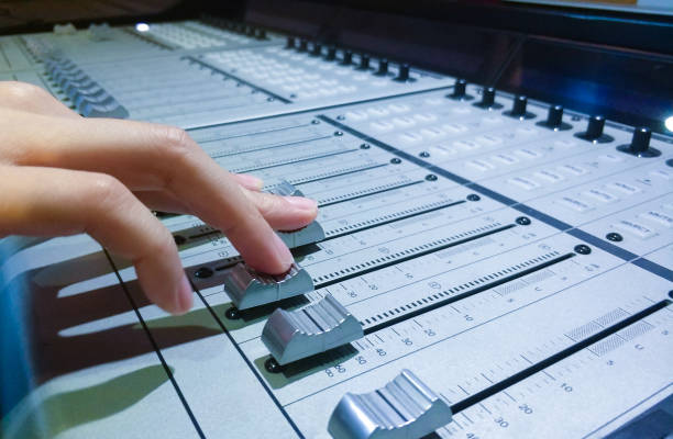 istock Hand with sound recording studio mixer 860476176