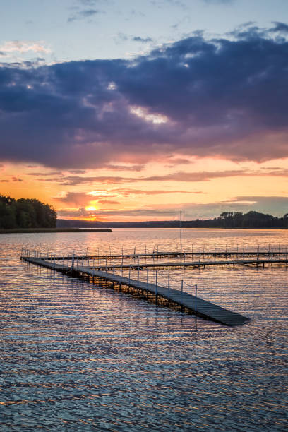 istock Stunning sunset at the lake with dynamic sky in summer 860480242
