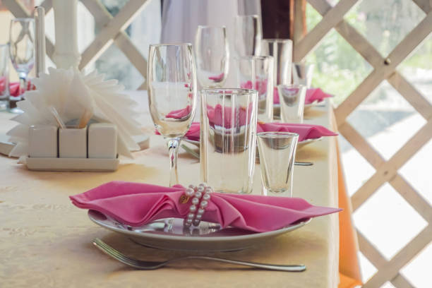 istock Table setting at a luxury wedding decorated with Pink wipes 860483986