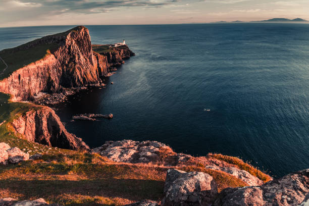 istock Dusk at the Neist point lighthouse, Scotland, UK 860487692