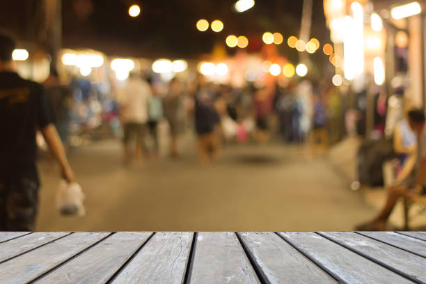 istock Old wooden on front blurred lamp light bokeh blackground, abstract 860491202