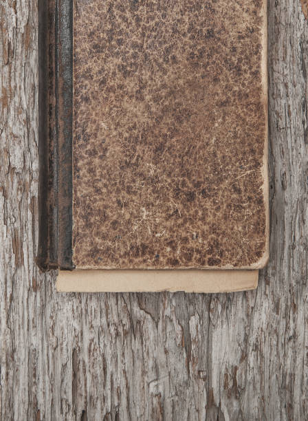 istock Vintage old book on the old wood 860499330