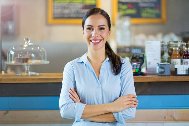 istock Young woman working at cafe 860499494