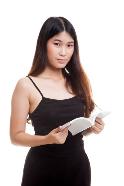 istock Young Asian woman with a book. 860499730