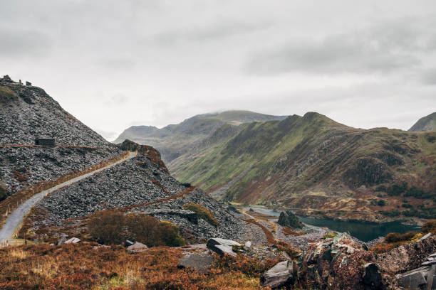 Mount Snowdon from Dinorwic slate quarry, Snowdonia National Park, North Wales Mount Snowdon from the disused Dinorwic slate quarry above Llanberis Village in Gwynedd, North Wales. mount snowdon photos stock pictures, royalty-free photos & images