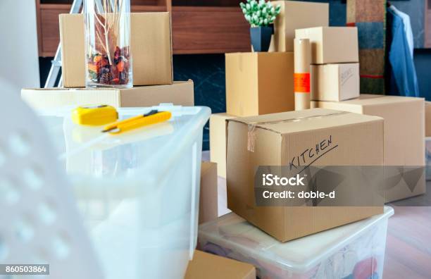Living Room With Moving Boxes Stock Photo - Download Image Now - Packing, Relocation, Motion