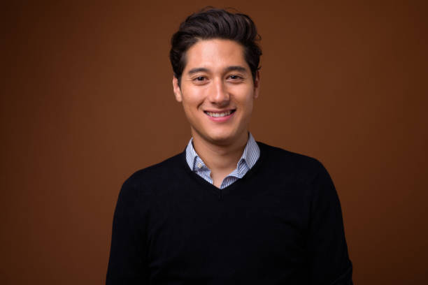 istock Studio shot of young multi-ethnic handsome man looking smart against colored background 860505088