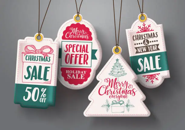 Vector illustration of Christmas hanging sale tags vector set in white with shapes