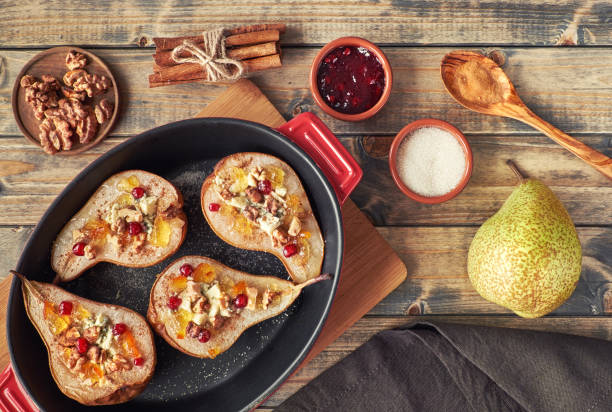 istock Pears baked with Blue cheese, wallnuts and jam 860509112