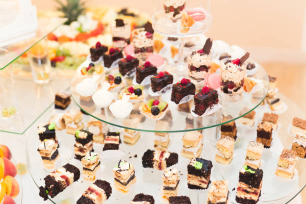 istock Delicious sweets on wedding candy buffet with desserts, cupcakes 860511728