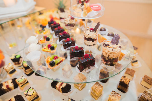 istock Delicious sweets on wedding candy buffet with desserts, cupcakes 860511742