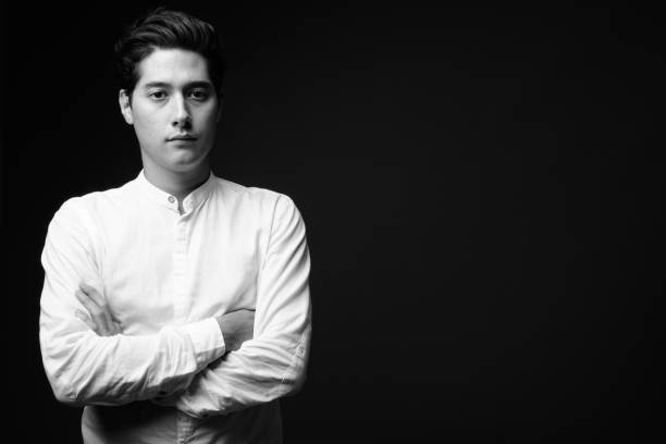 istock Studio shot of young multi-ethnic handsome man against black background 860512114
