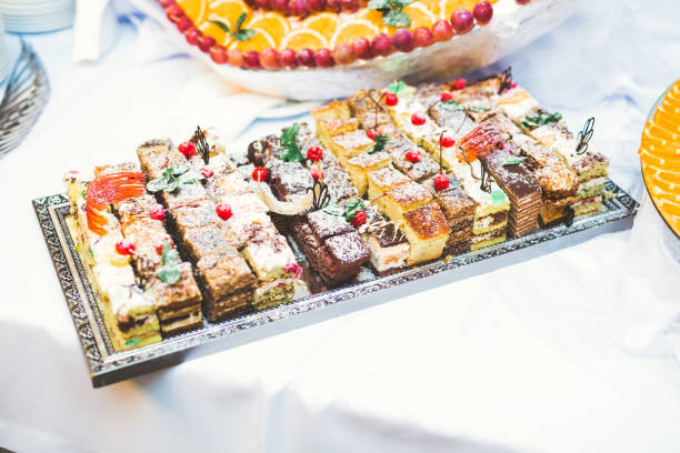 istock Delicious sweets on wedding candy buffet with desserts, cupcakes 860512120