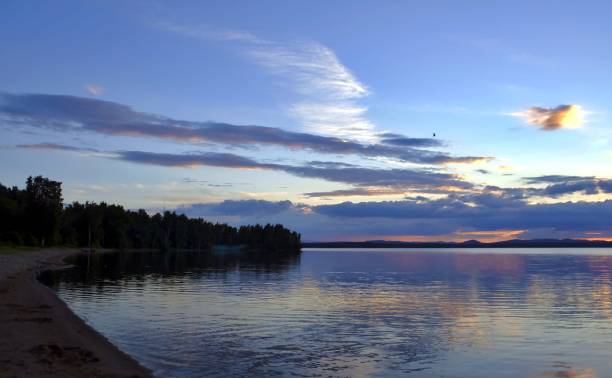 istock evening colorful cloudy sky over the lake 860514488