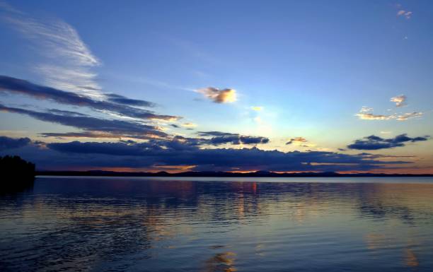 istock evening colorful cloudy sky over the lake 860515008