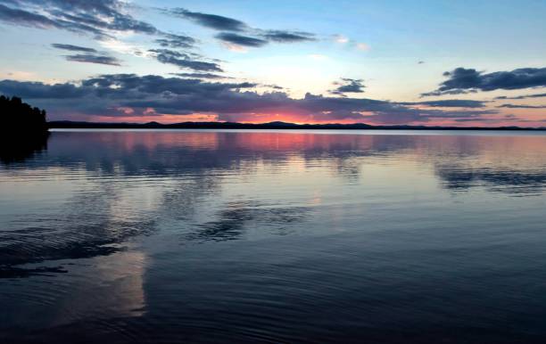 istock evening colorful cloudy sky over the lake 860515360