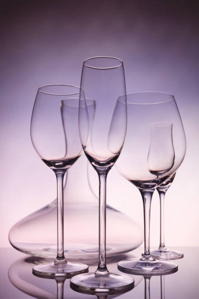 istock Glassware selection with wine, champagne, liquour glasses and decanter on creative background 860515904