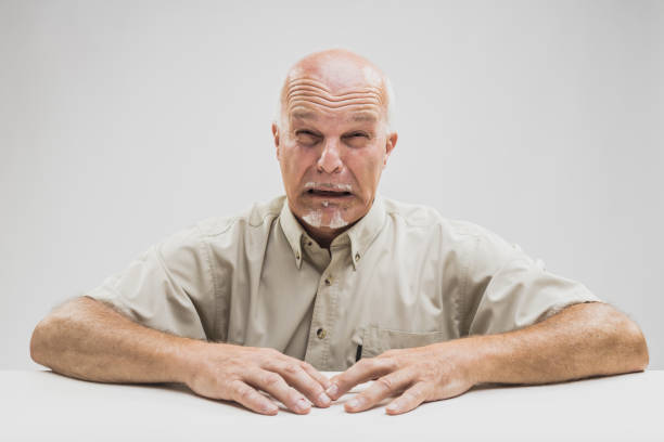 istock Emotional tearful elderly man blubbering 860525458