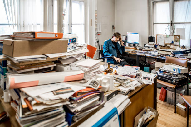 istock Discouraged Entrepreneur In His Overload Office 860536720
