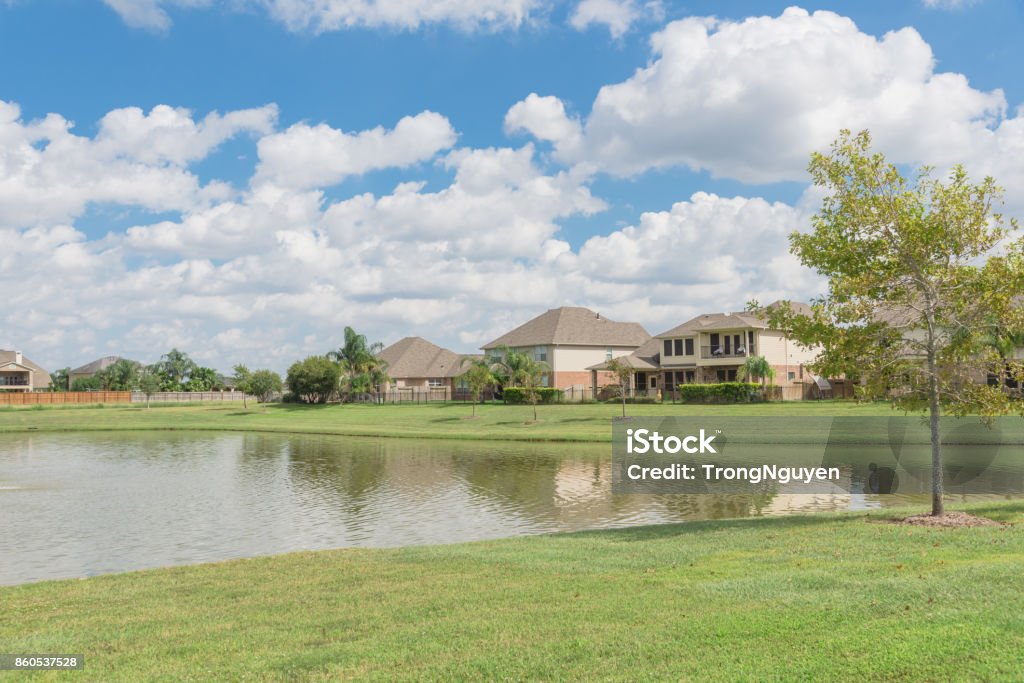 Residential houses by the lake in Pearland, Texas, USA Residential houses by the lake in Pearland, Texas, USA. Pearland Stock Photo