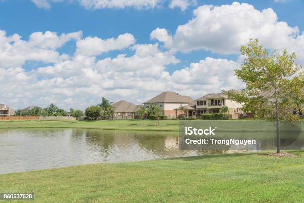 Residential Houses By The Lake In Pearland Texas Usa Stock Photo - Download Image Now