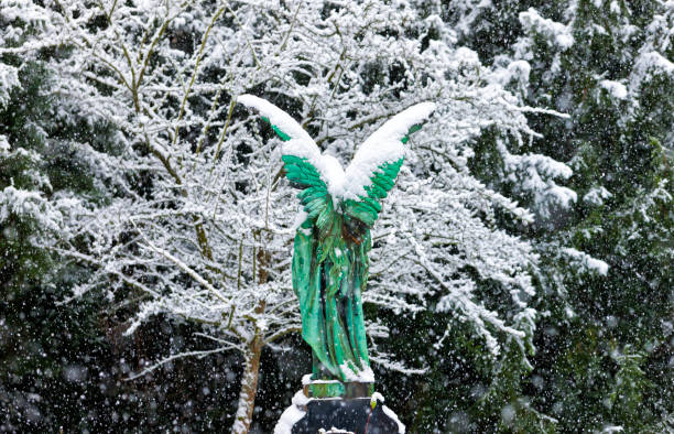 istock Angel statue at the Melaten Graveyard in wintertime, Cologne 860541040