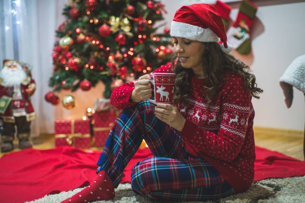 istock Woman drinking hot drink 860562488