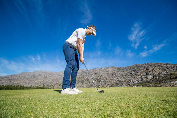 istock Golfer teeing off from a golf tee on a bright sunny day on a golf course in South Africa 860563048
