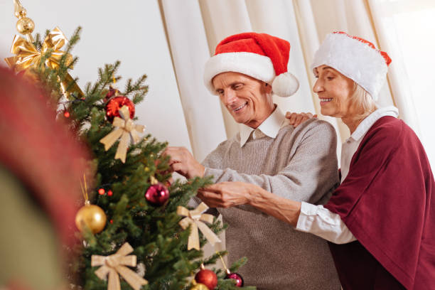 istock Happy elderly woman embracing her husband 860567778