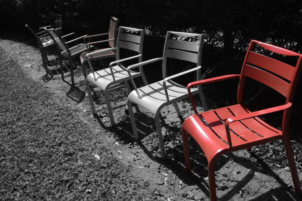 istock Red chair in the garden 860568020