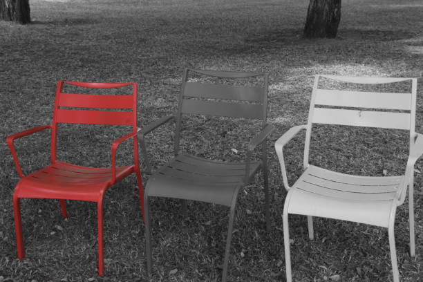 istock Red chair in the garden 860568024