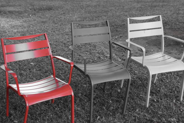 istock Red chair in the garden 860568282