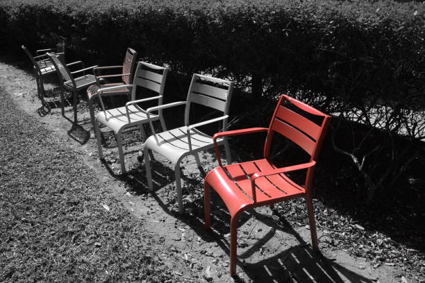 istock Red chair in the garden 860570986
