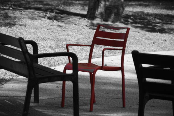 istock Red chair in the garden 860570990