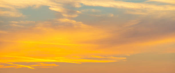 istock Clouds in a multicolored sky at sunset in summer 860574172