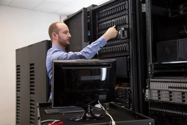 Photo of Changing drive in server installation in large datacenter