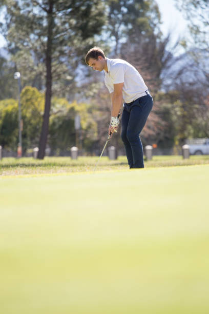istock Golfer playing a chip shot on a golf course in South Africa 860578494