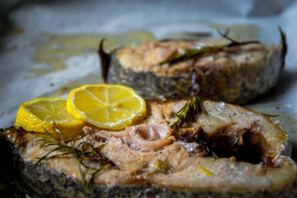 istock Grilled yellowtail amberjack with lemon slices 860605416