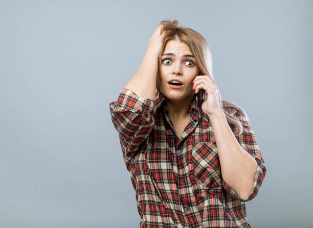istock Young beautiful girl with smartphone 860610292