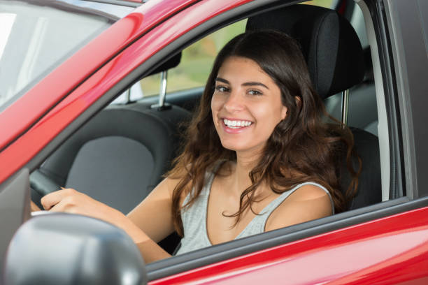 istock Happy Woman Driving Car 860610706