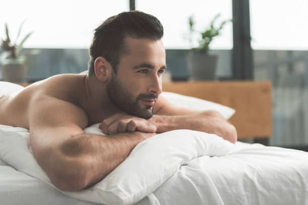 istock Calm guy dreaming in bedroom 860615224