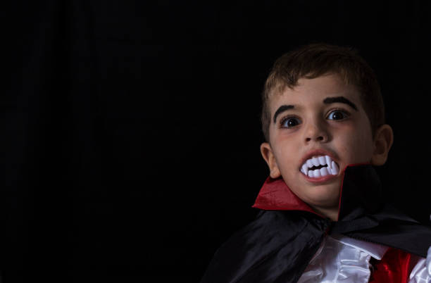 Boy Disguised As A Vampire Stock Photo - Download Image Now - Vampire,  Halloween, Child - iStock