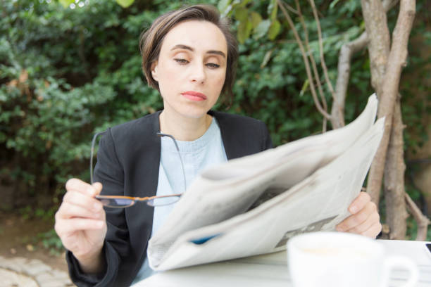 istock Businesswoman Having Coffee Break 860628360