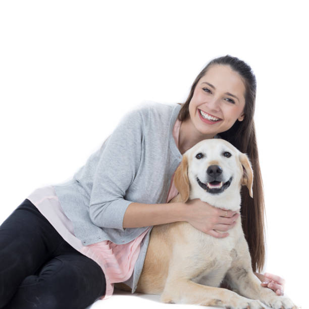 istock Confident woman enjoys time with her dog 860628734