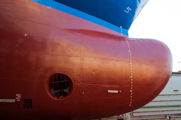 ships bow with draft marks and bow thruster - industrial ship shipping painting repairing imagens e fotografias de stock